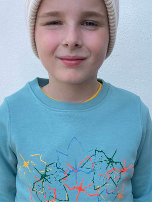 Closeup of a child wearing The 'Rambler' Children's Printed Sweatshirt.