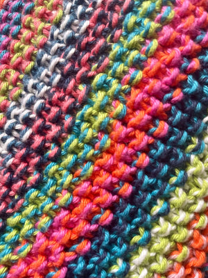 Closeup of the The Faraway Gang hand-knitted baby blanket stitch.