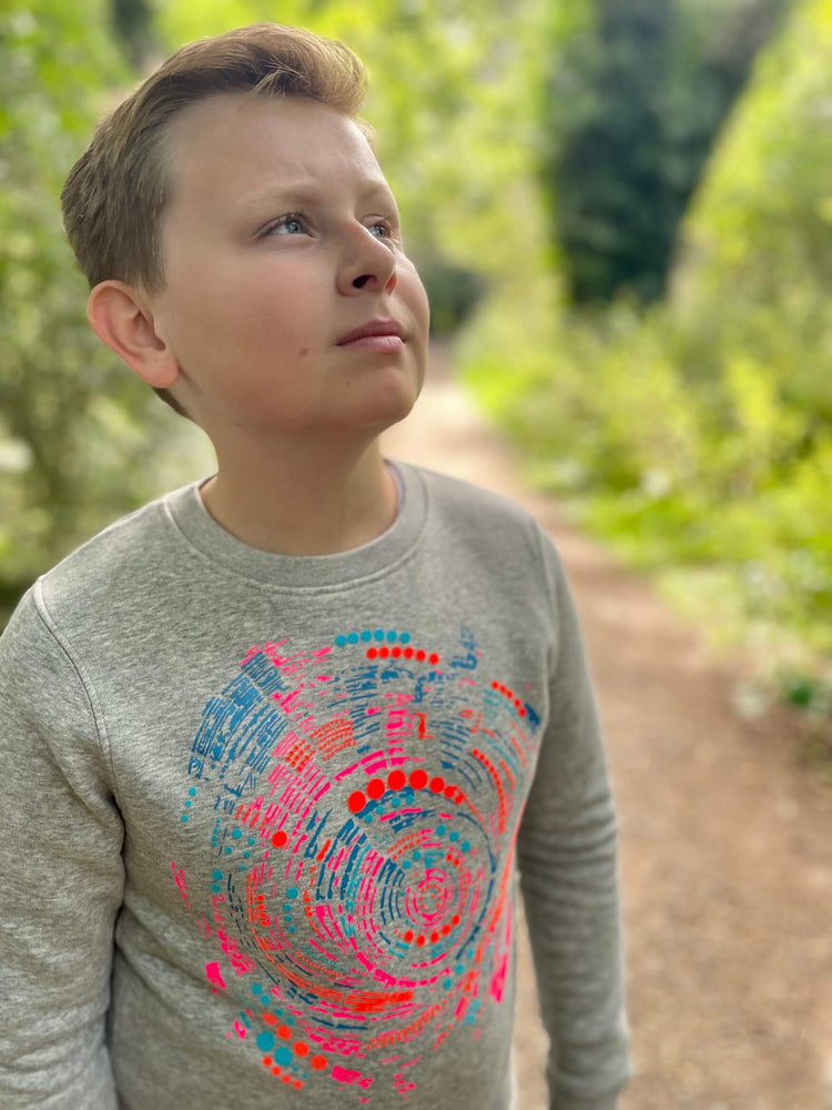 
            
                Load image into Gallery viewer, Boy wearing The &amp;#39;Climber&amp;#39; Children&amp;#39;s Printed Sweatshirt looking up at the sky.
            
        