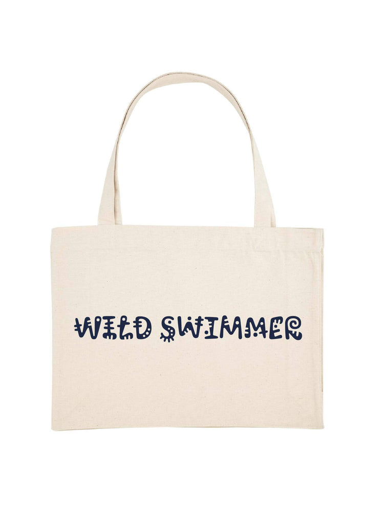 Natural colour shopping tote with wild swimmer printed in navy.