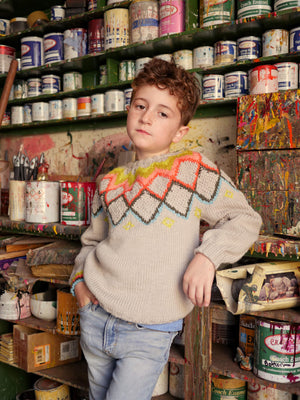 The wanderer hand-knit worn on a boy.
