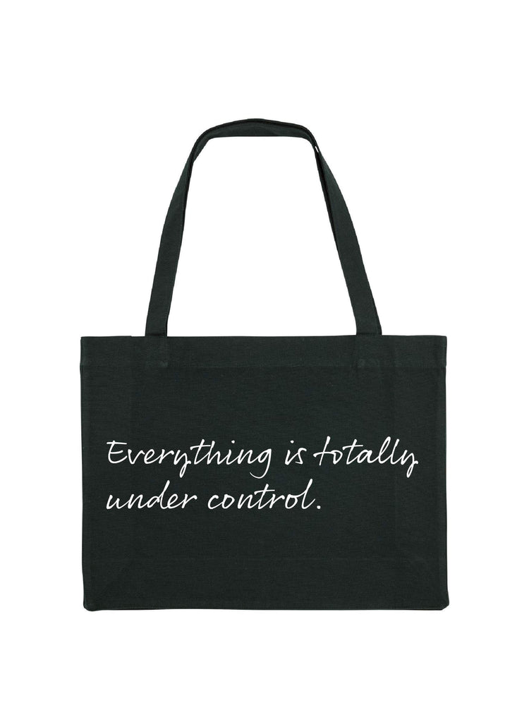 Black shopping tote with Everything is totally fine printed on it in white.