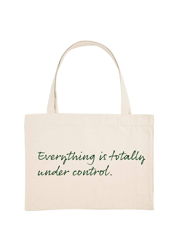 Natural colour shopping tote with Everything is totally fine printed on it in dark green.