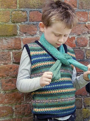 Yound boy wearing The Faraway Gang knitted vest.